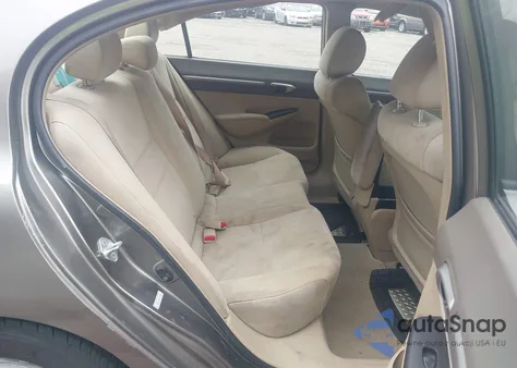 2006 Honda Civic Hybrid from USA, damaged, VIN JHMFA36216S014499